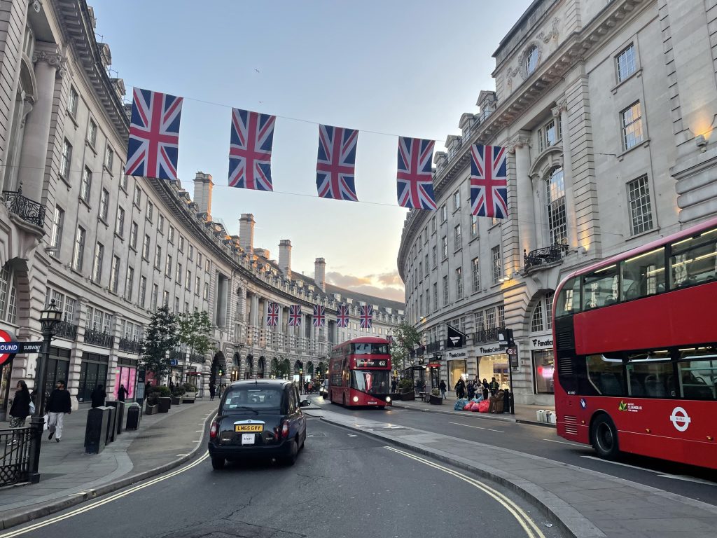 View of Regents Street, London with Union Jack flags.