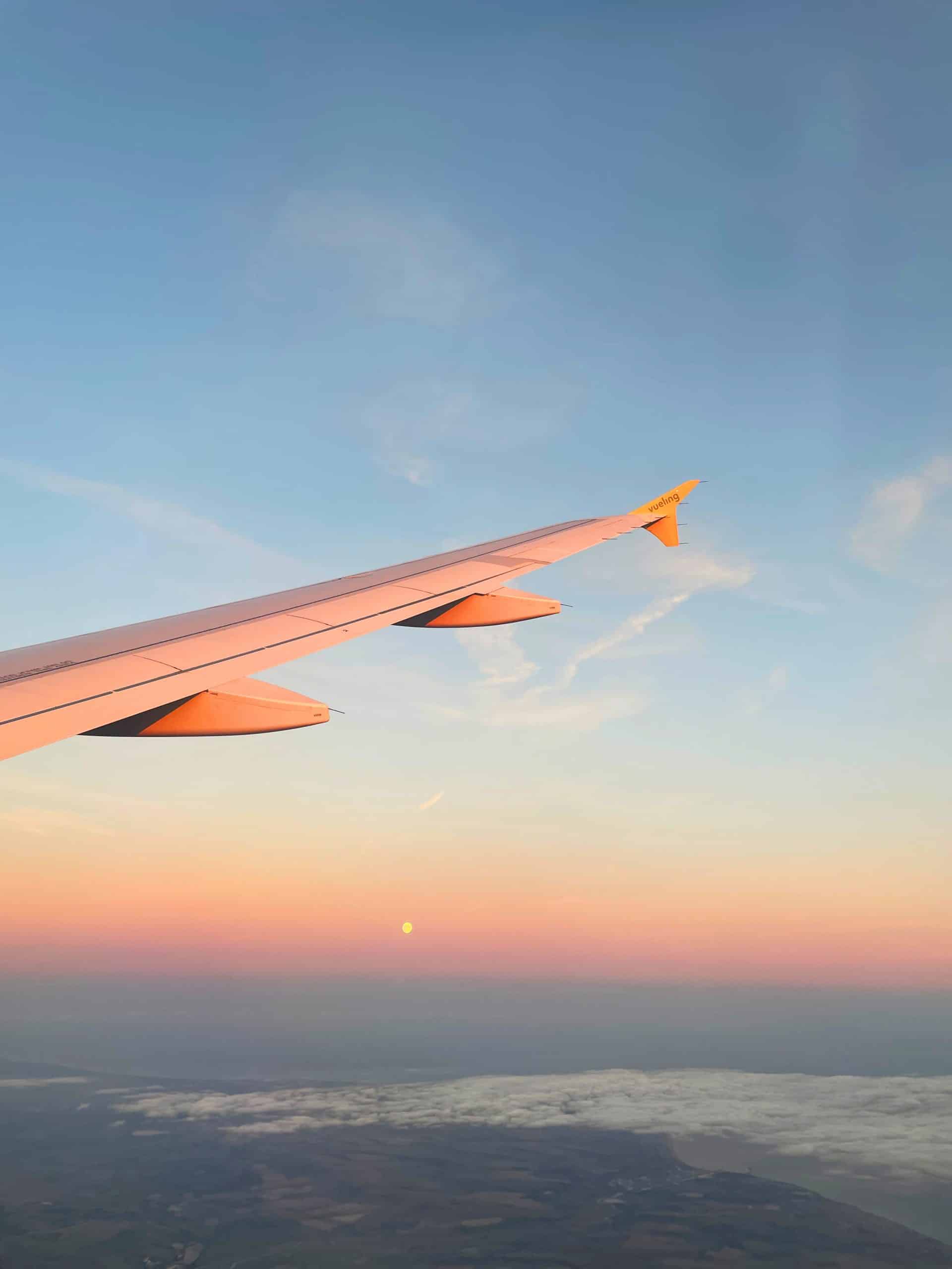 Sunset over a plane wing high in the sky!