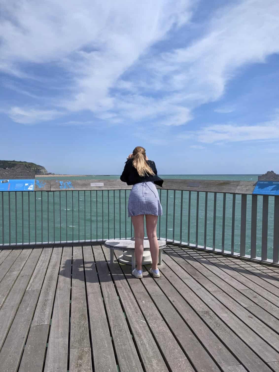 Me using the binoculars on Hastings Pier