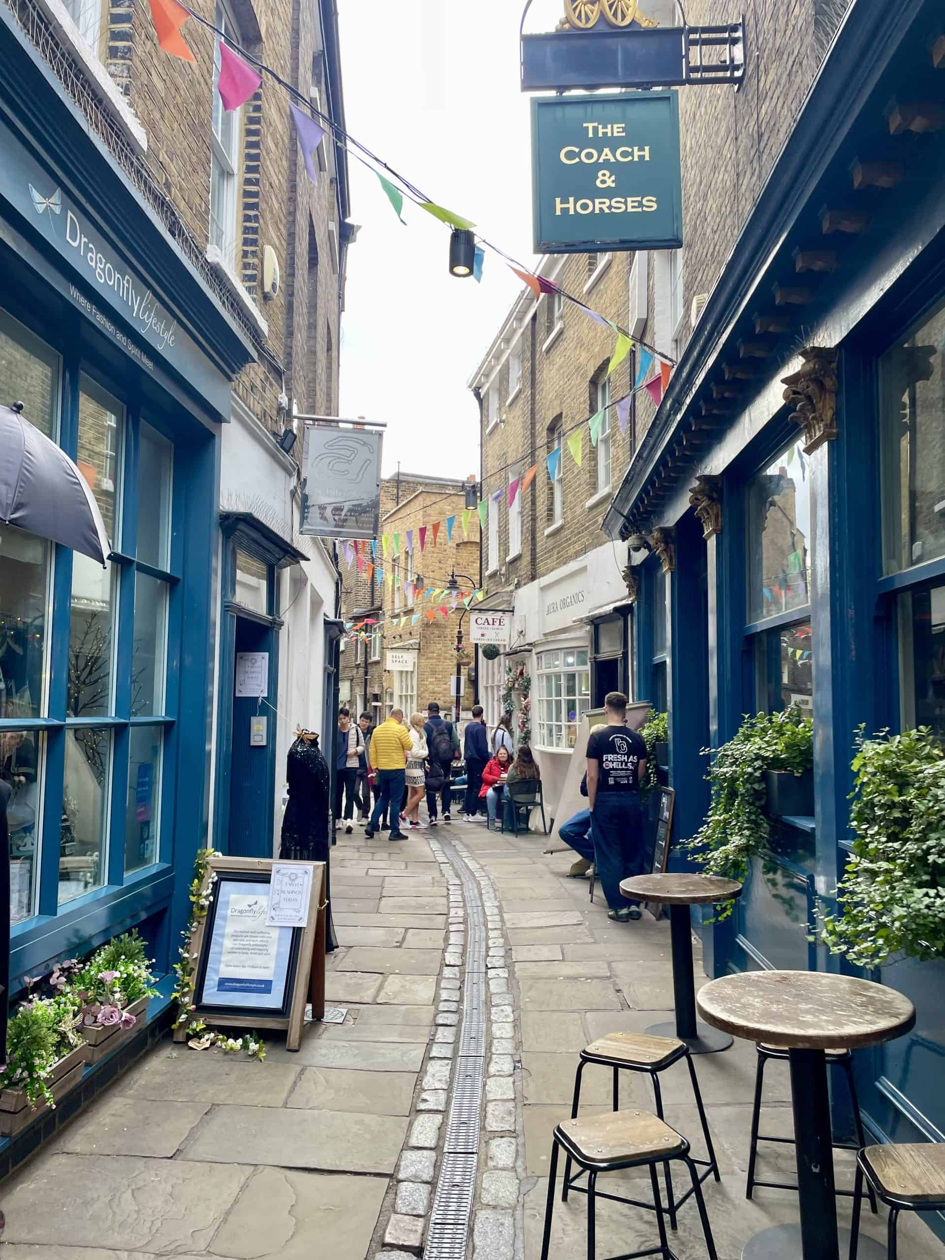 Cute passage lined with cafes and shops in Greenwich